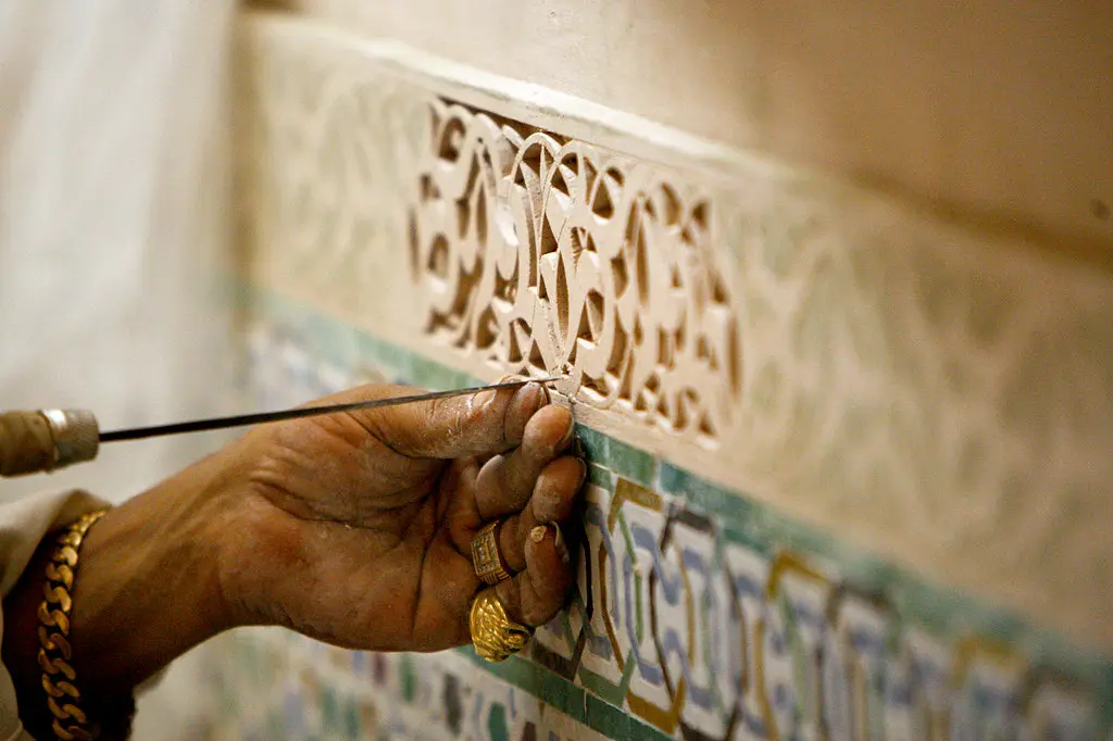 Artisan at work on Moroccan courtyard